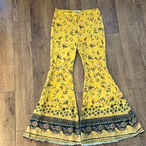 Free People “Just Float on Printed Flare Jeans”.